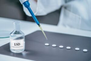 Psychedelic Drug LSD Therapy Research, Scientist Preparing Small Doses of LSD in Laboratory